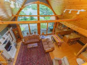 living room with vaulted ceilings