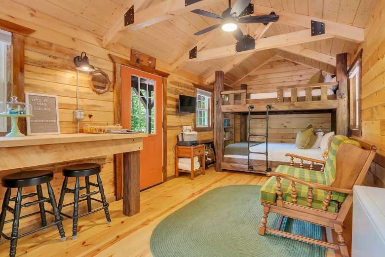 cabin interior with queen bunk beds