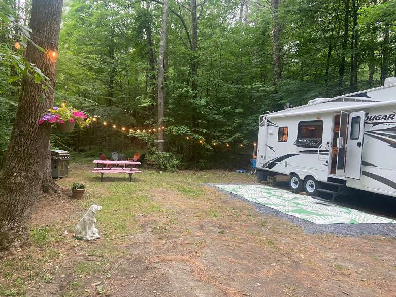 RV with picnic table in front