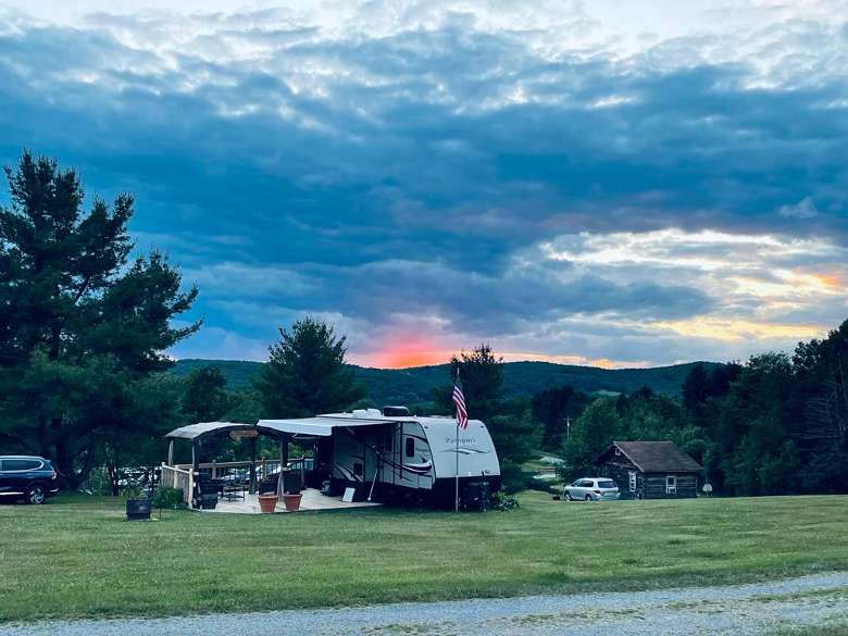 Sunset with RV and mountain in background