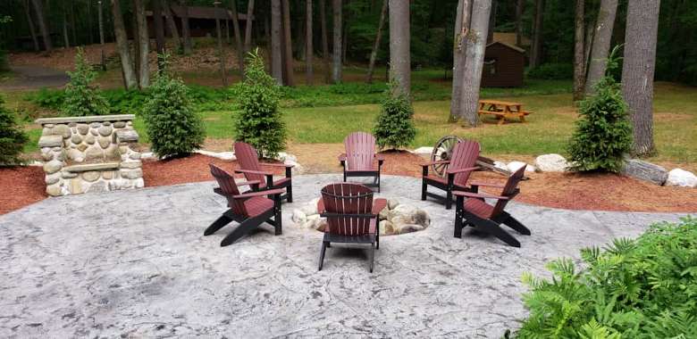 fire pit with Adirondack chairs