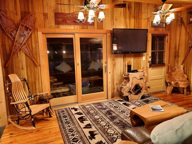 wooden living room with rocking chair