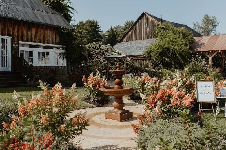 wishing fountain with barns in the back