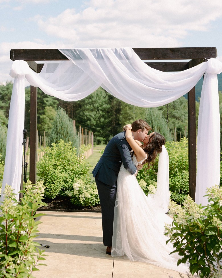 bride and groom embrace