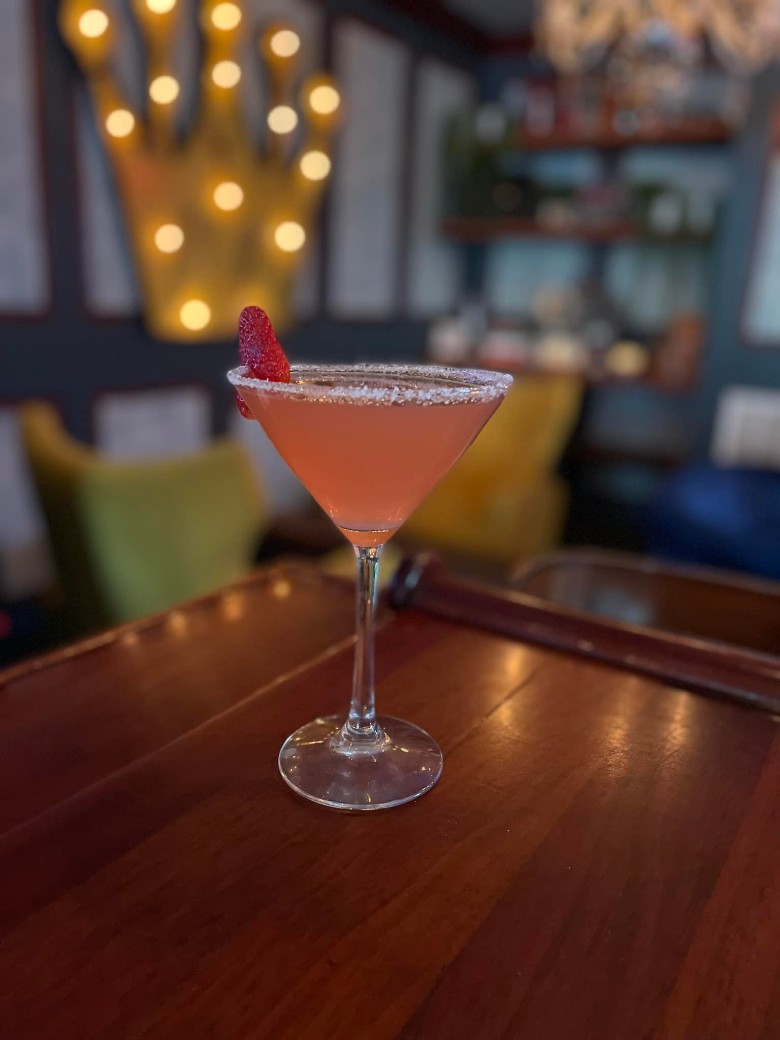 pink cocktail on a bar