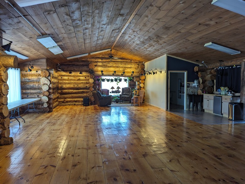 Open floor space in a log cabin