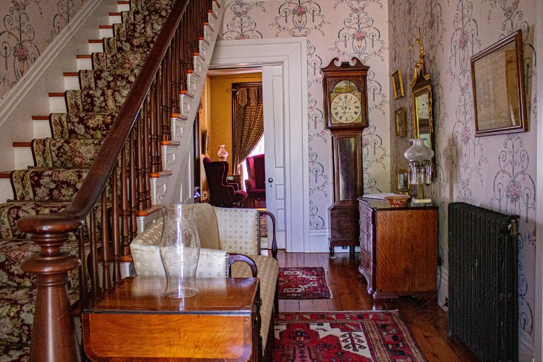 staircase and grandfather clock