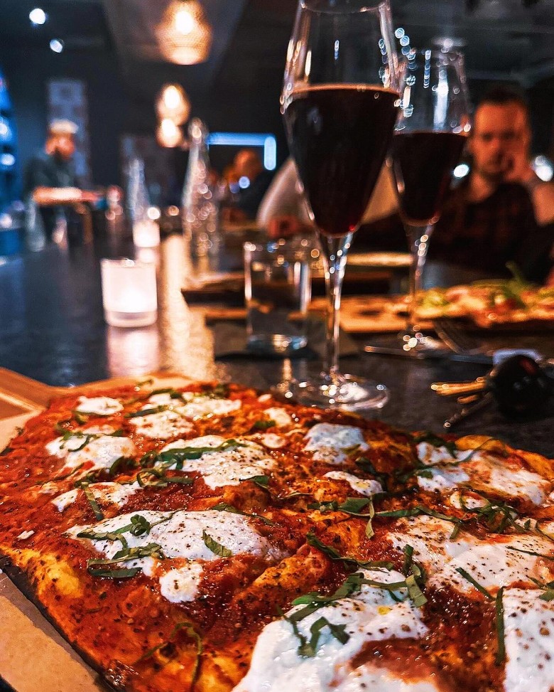 wine glasses and pizza