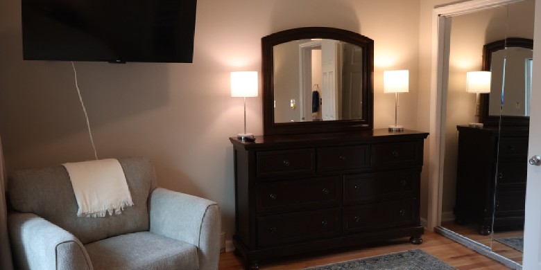 king bedroom mirror and chair