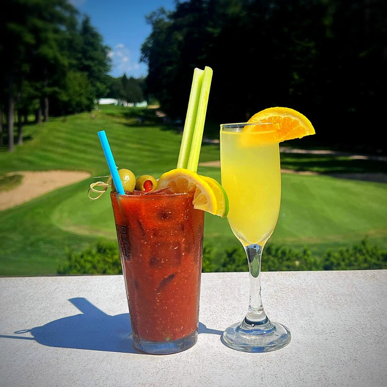 two drinks overlooking golf course