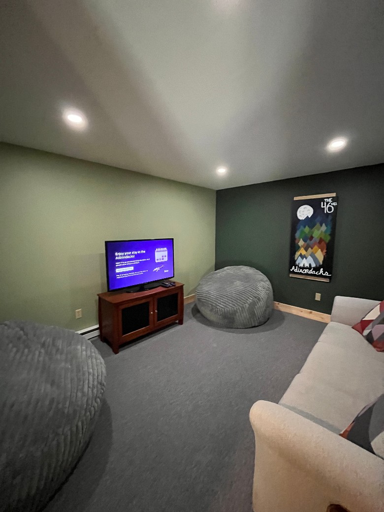 The movie room in the basement is the perfect place to curl up and watch a movie or show from your favorite streaming service.