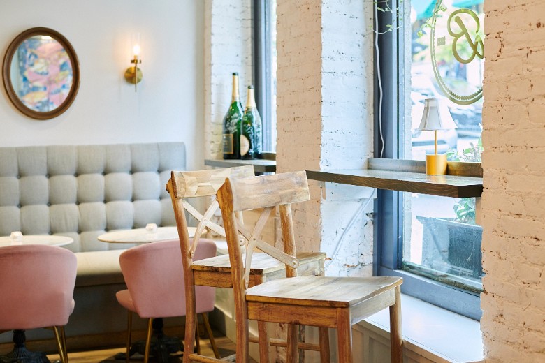 chairs by the window in a champagne bar
