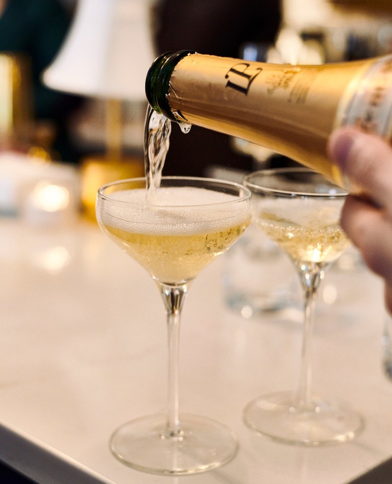 champagne being poured into glass