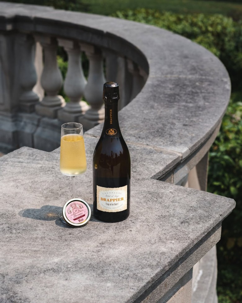 a bottle of champagne with a glass