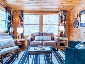 living room with couch and chairs