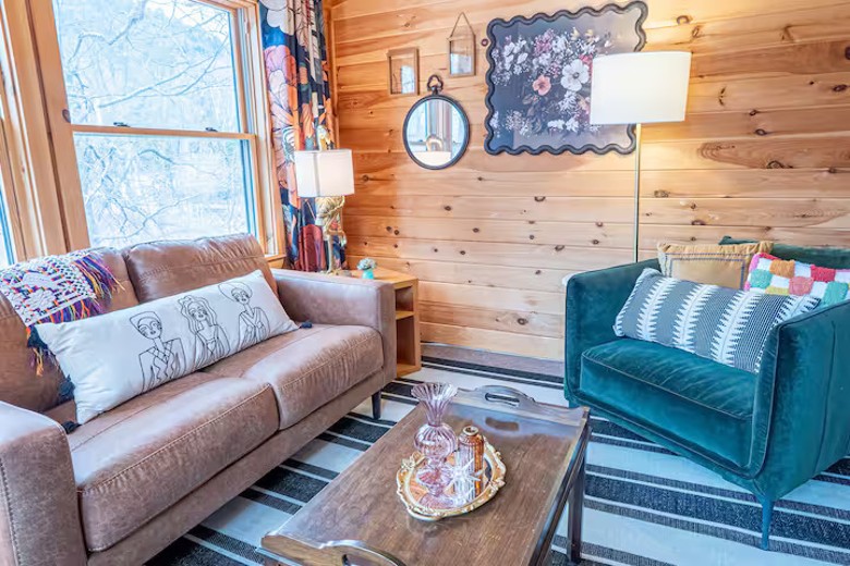 living room with couch and chairs