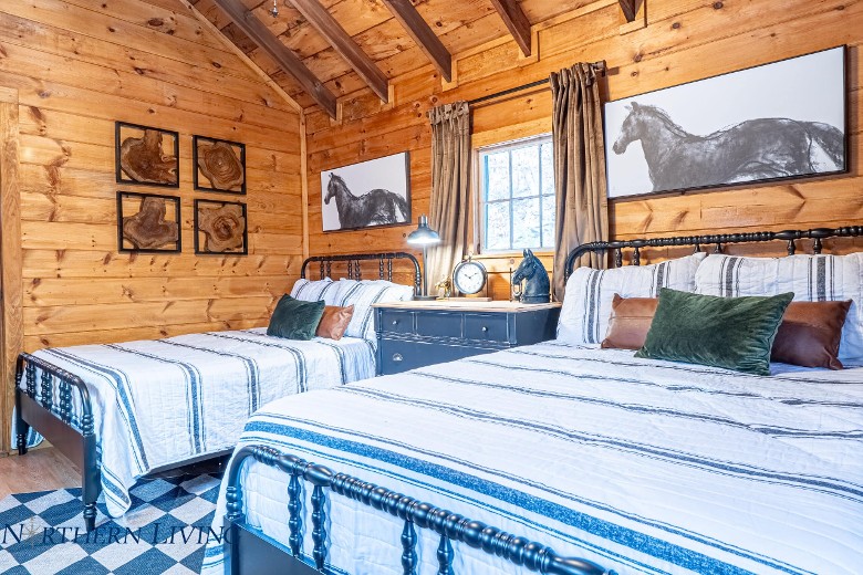 two full beds in a cabin