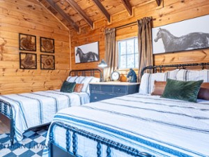 two full beds in a cabin