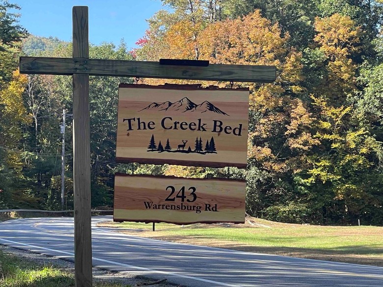 creekbed house sign