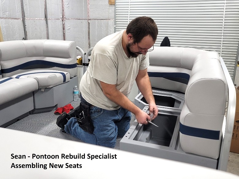 staff member sean repairing a pontoon boat