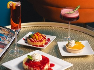 small plates of food and cocktails on table