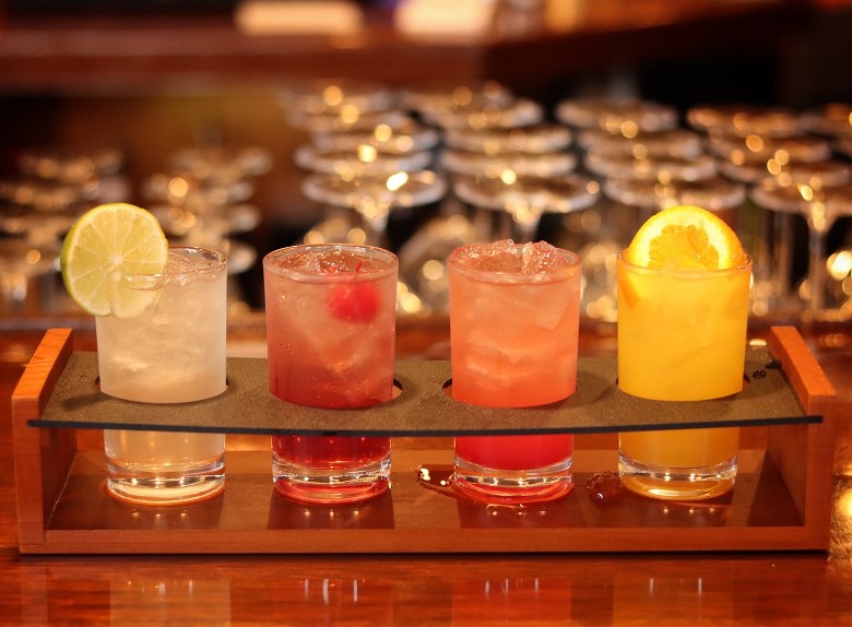 four colorful cocktails