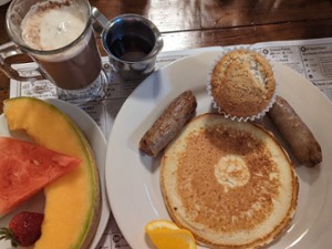 breakfast items with coffee and syrup