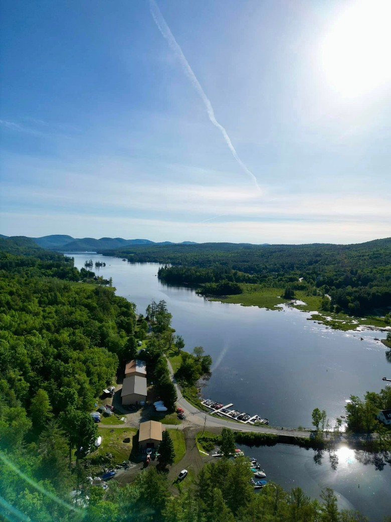 aerial view of a lake and road