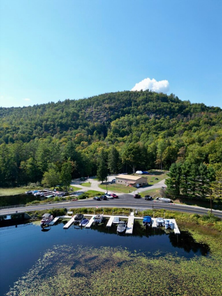 aerial view of a lake and road