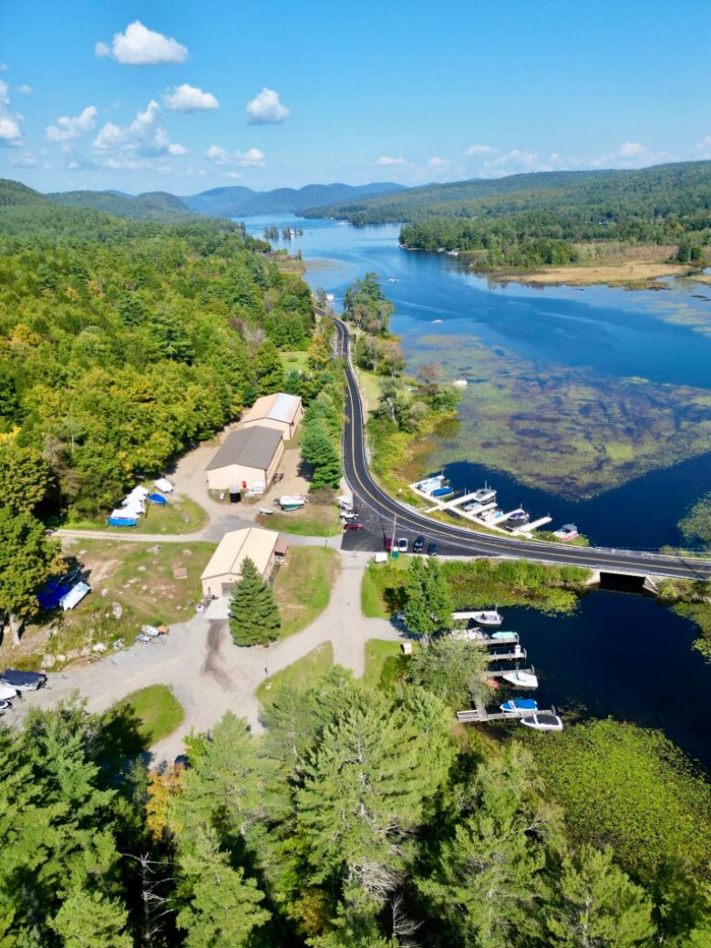 aerial view of a lake and road