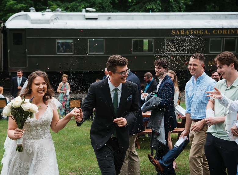 just married couple walking down aisle