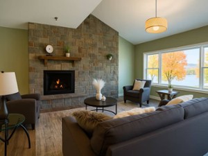 living room with fire in fireplace