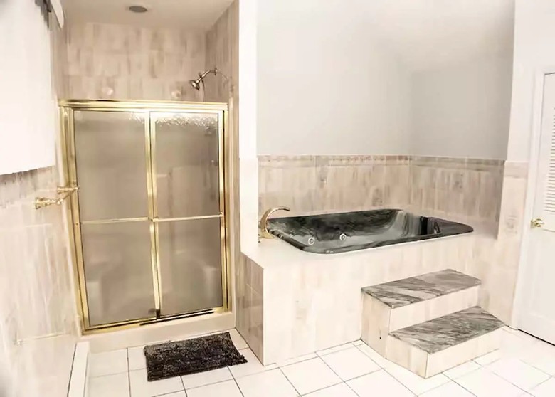 bathroom with hot tub