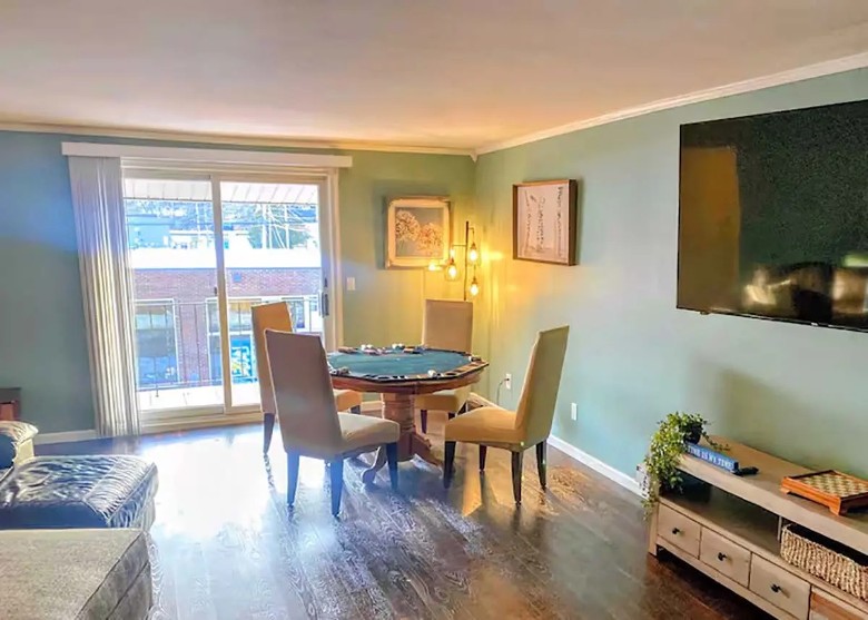 living area with a poker table