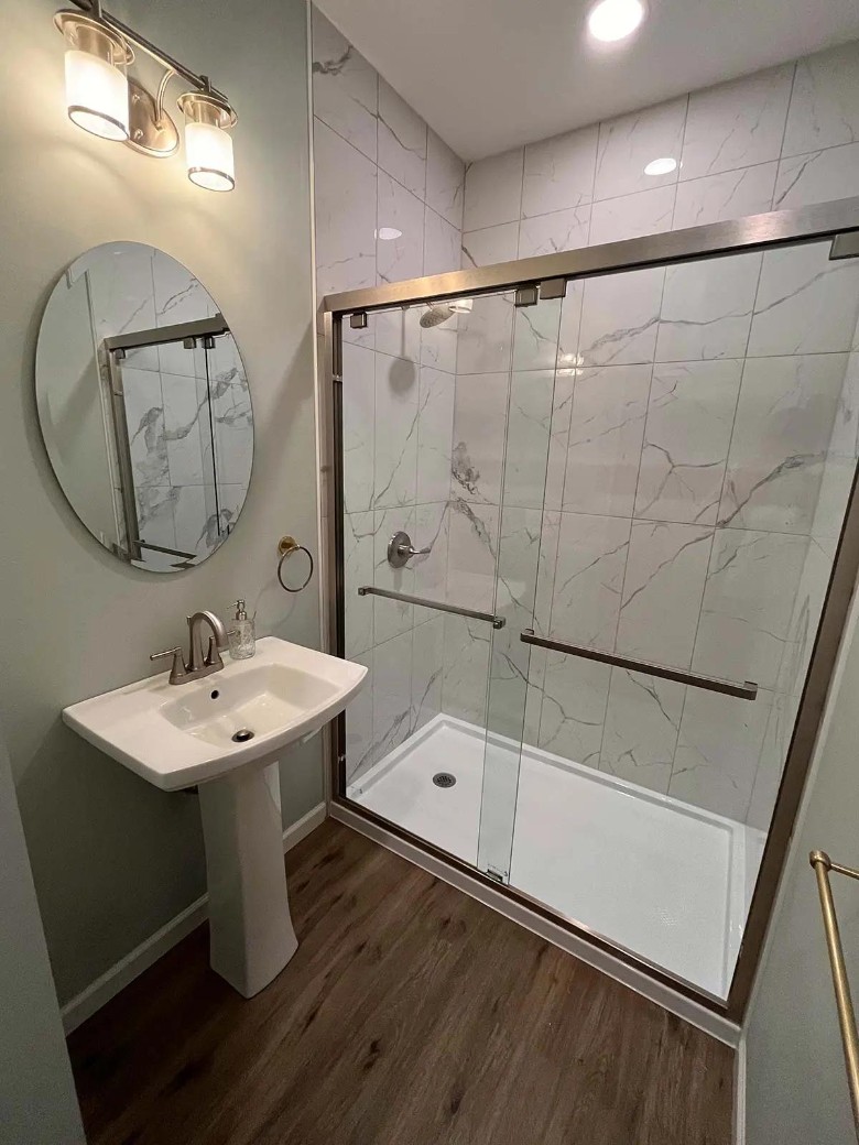 bathroom sink and glass shower
