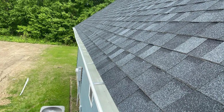 This completed project reflects the TopGen standard: clean, durable, dependable. roof shingles on a roof