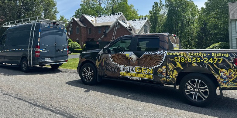 Precision roof installation tailored to withstand Upstate NY weather. topgen roofing truck outside homes