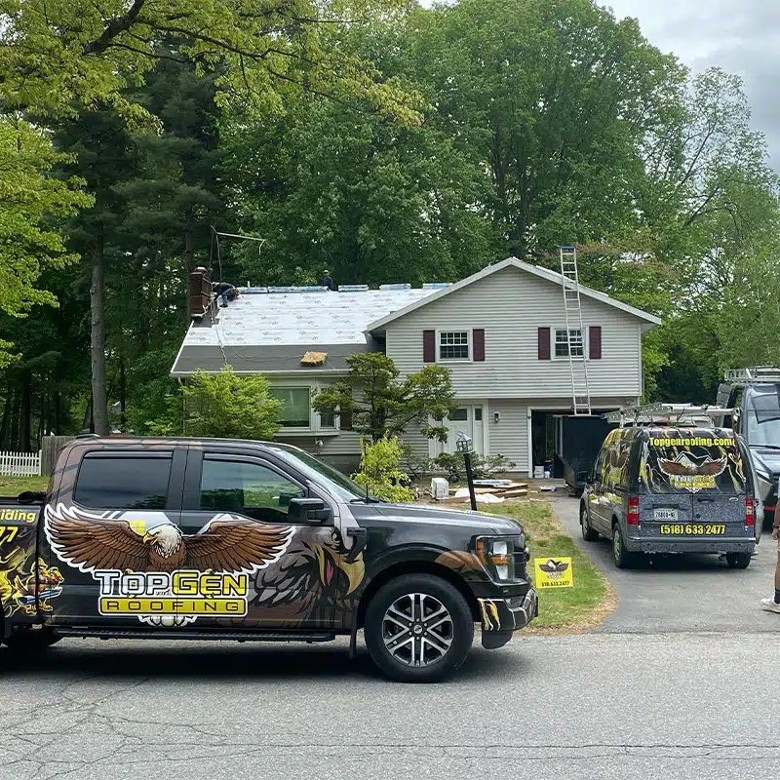 No pressure, no surprises—just honest roofing from people who care. house with topgen roofing truck in front