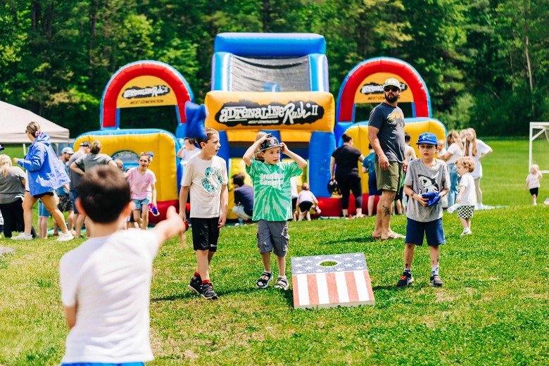 kids at inflatable obstacle course