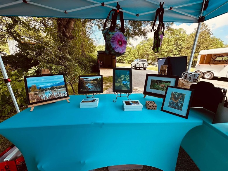 artworks in vendor tent