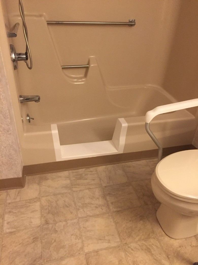 tub to shower conversion with toilet nearby