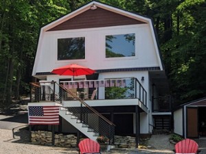 This lakefront vacation home rental in Fort Ann, NY offers a cozy, newly renovated space for your next lake getaway