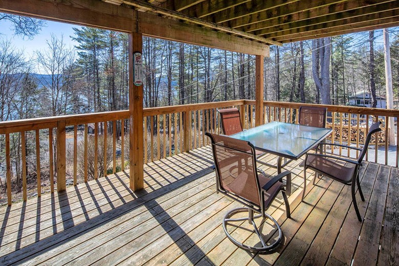 back deck with table and chairs
