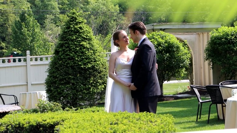 bride and groom in a garden area
