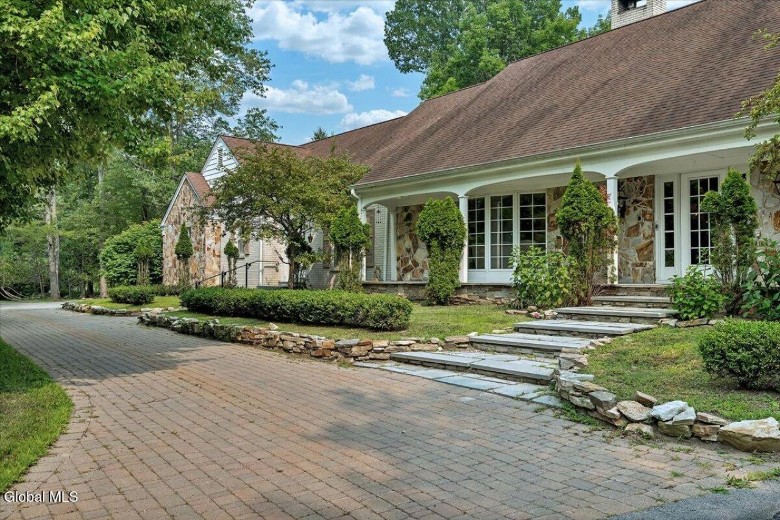 long house with stone front