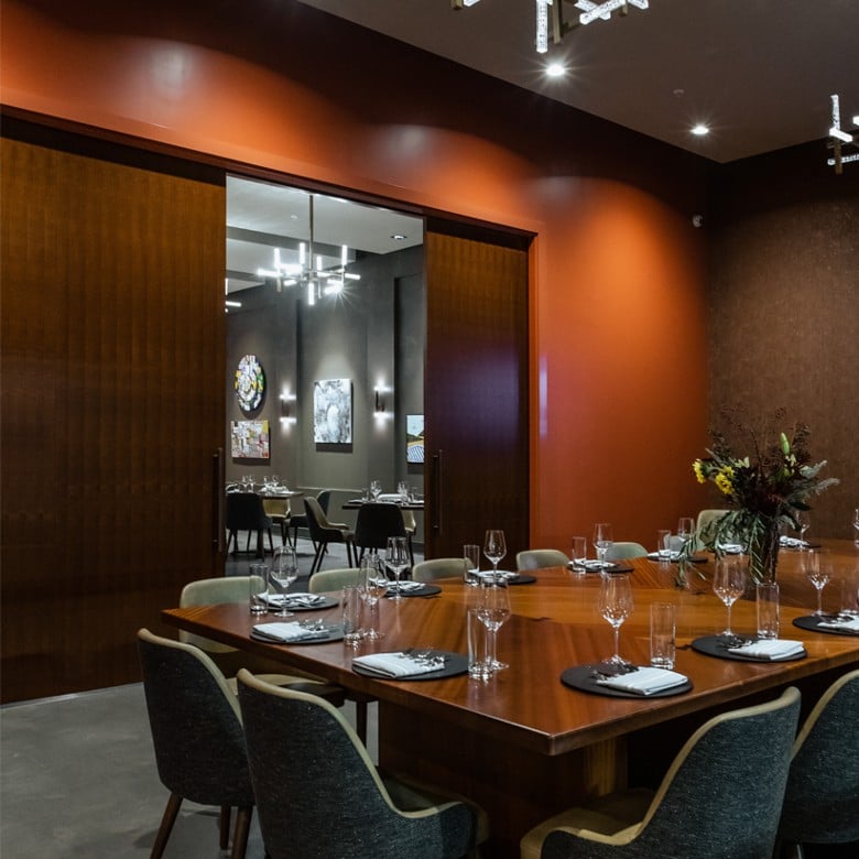 private dining room with a table and chairs