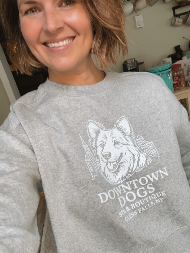 woman wearing a downtown dogs shirt