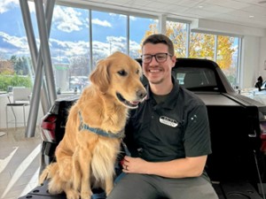 Product Specialist Allen Loomis with dog at Garvey Hyundai