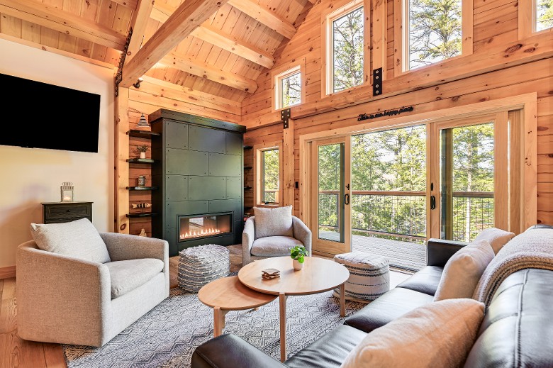 rustic living room with a fireplace and seating