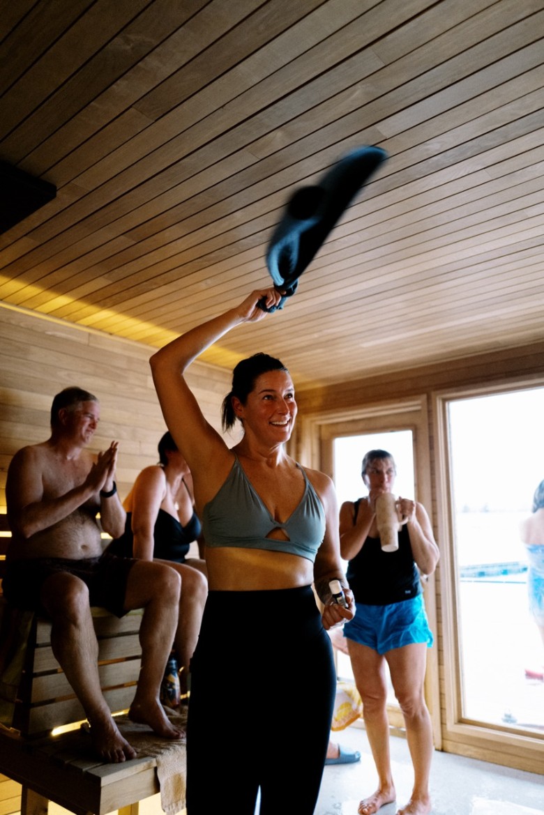 people in a floating sauna